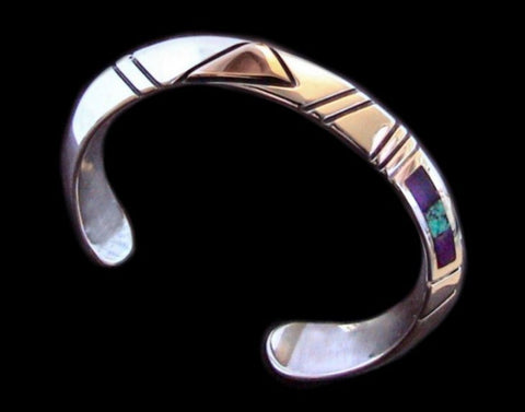 Sterling Triangle Wire Inlay bracelet by Ron Henry, Navajo silversmith. This bracelet is handmade using sterling silver triangle wire. Both sides of the bracelet has inlaid turquoise, sugilite, coral and opal. The stones can be customized depending on availability.